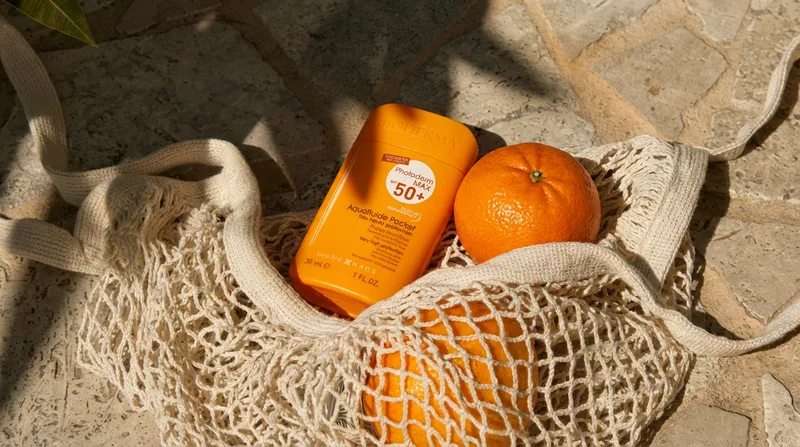 Suncare product styled with fresh fruit for a summer campaign, made with MITO